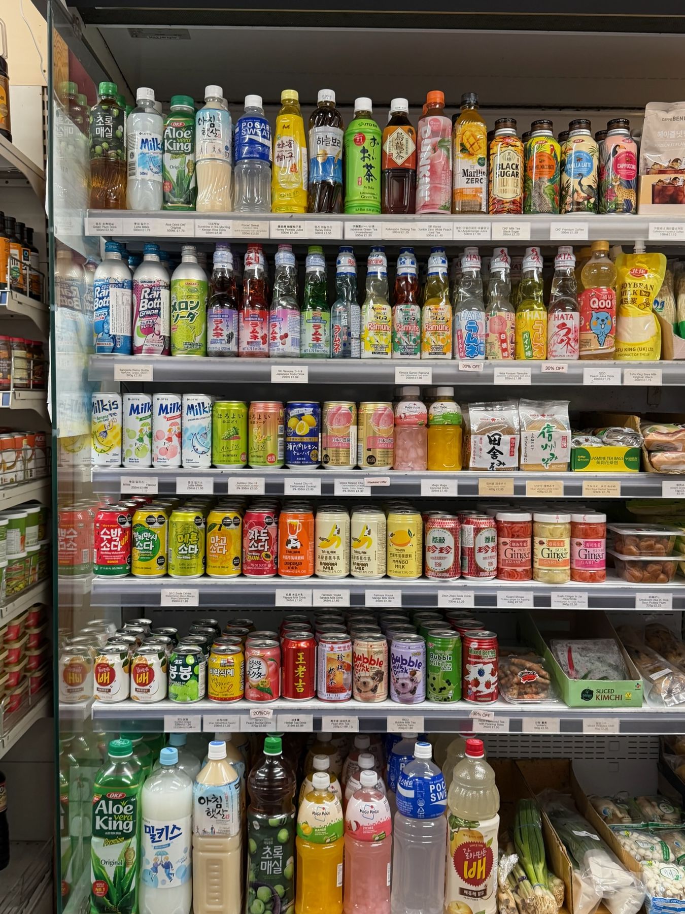 Refrigerated shelves of Korean and Japanese soft drinks, ramune, milk drinks and bubble tea